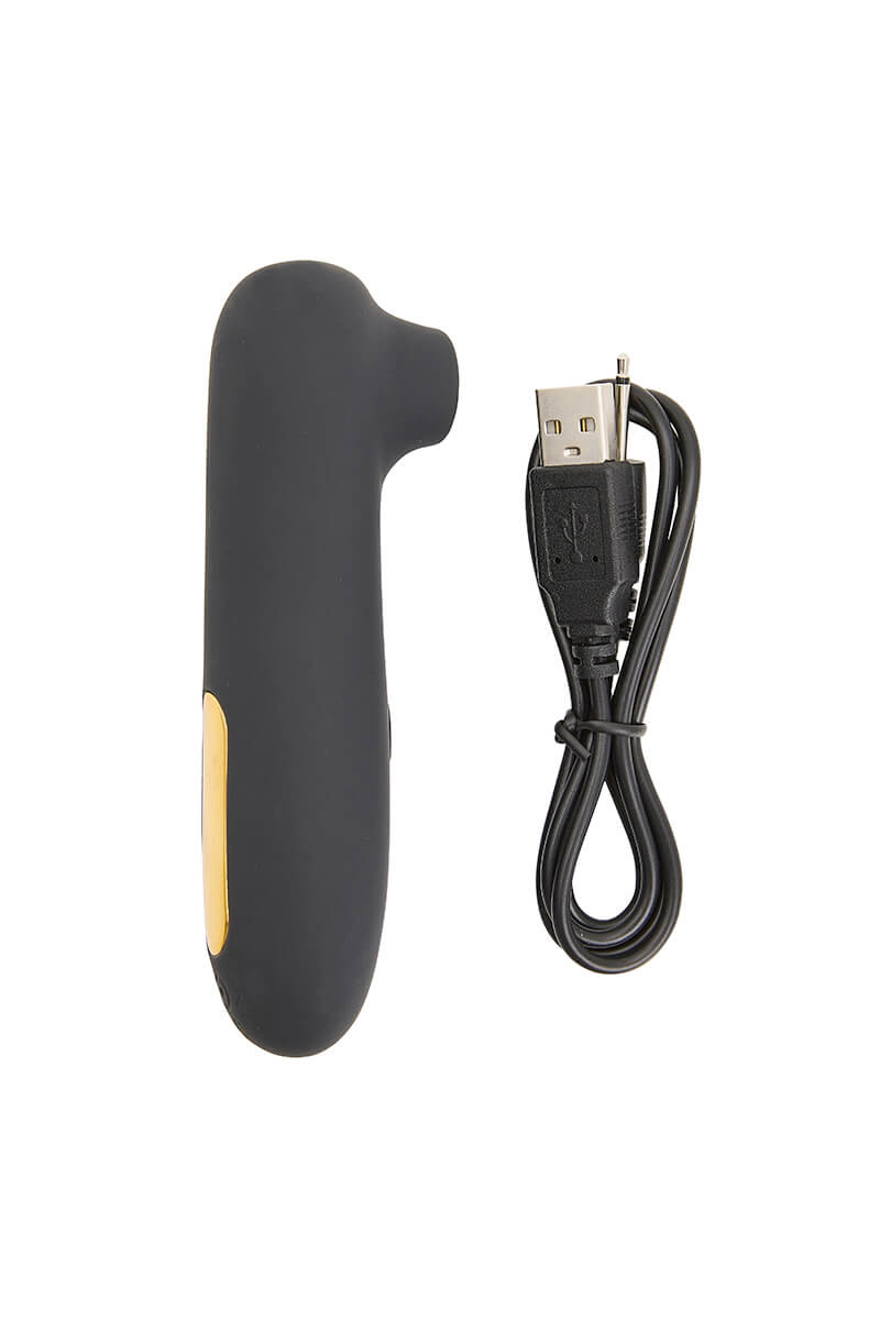 Stimulateur clitoridien noir et doré le captivant de la marque Jacquie et Michel