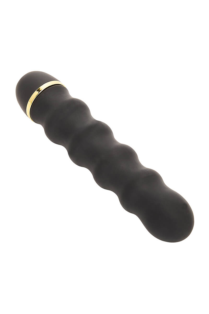 Vibromasseur ondulé noir et doré le glamour de la marque Jacquie et Michel