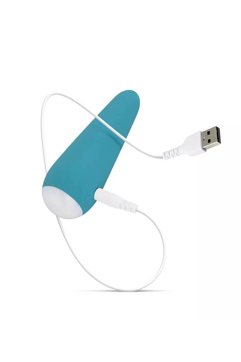 Mini vibromasseur bleu turquoise julia et son chargeur de la marque Cala Azul