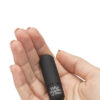 Mini vibromasseur heavenly massage représenté dans une main de femme de la collection fifty shades of grey