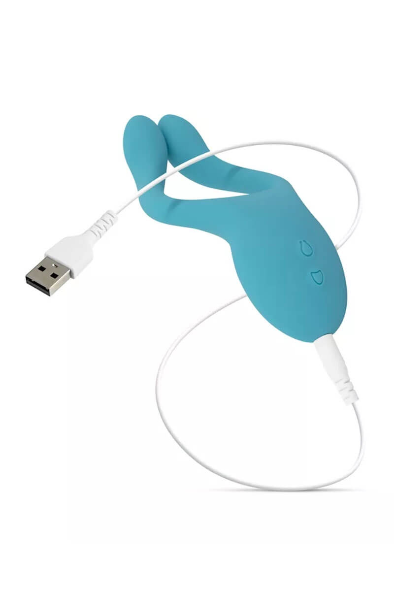 Stimulateur pour couple dani bleu turquoise avec son chargeur de la marque Cala Azul