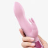 Vibromasseur Rabbit Hello Rabbit de la marque Love to Love dans une main