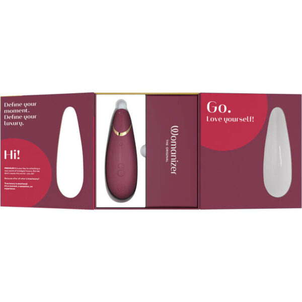 Packaging du stimulateur clitoridien Premium 2 bordeaux de la marque Womanizer